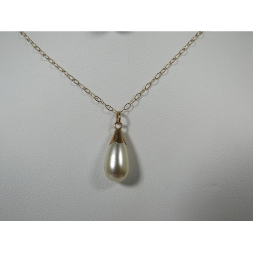 109 - 9ct Yellow Gold Pearl set pendant hung upon a 16 inch 9ct Yellow Gold Chain plus a Jade set 9ct Yell... 