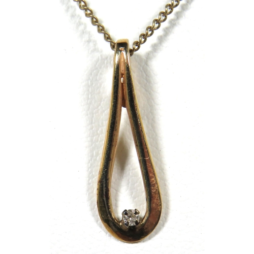 110 - 9ct Yellow Gold Loop pendant set with a tiny Diamond, Hung upon a 16 inch, 9ct Yellow Gold Chain. To... 