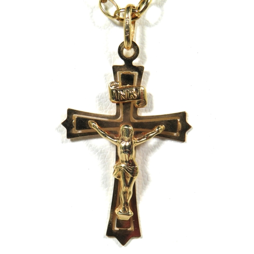 112 - 9ct Yellow Gold Crucifix which measures approx 35mm Hung upon a 22 inch 9ct Yellow Gold Belcher Chai... 