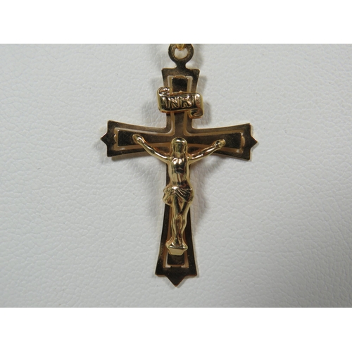 112 - 9ct Yellow Gold Crucifix which measures approx 35mm Hung upon a 22 inch 9ct Yellow Gold Belcher Chai... 