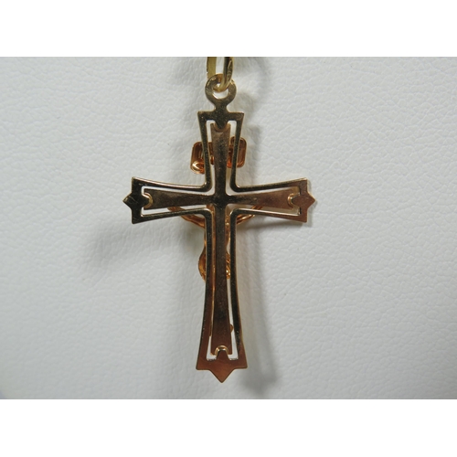 112 - 9ct Yellow Gold Crucifix which measures approx 35mm Hung upon a 22 inch 9ct Yellow Gold Belcher Chai... 