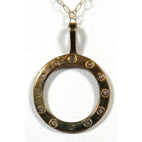 114 - 9ct Yellow Gold Circular 'Porthole' Pendant set with 12 Tiny Diamonds hung upon a 16 inch 9ct Yellow... 