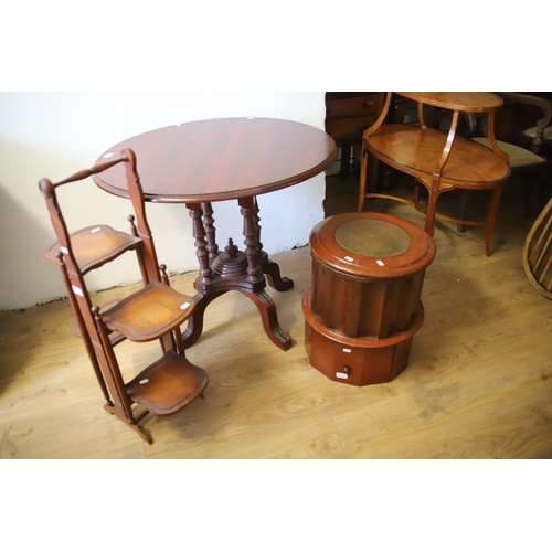 1295 - Mixed lot to include and Circular topped Table, a Folding Cake servier plus a Mahogany Commode which... 