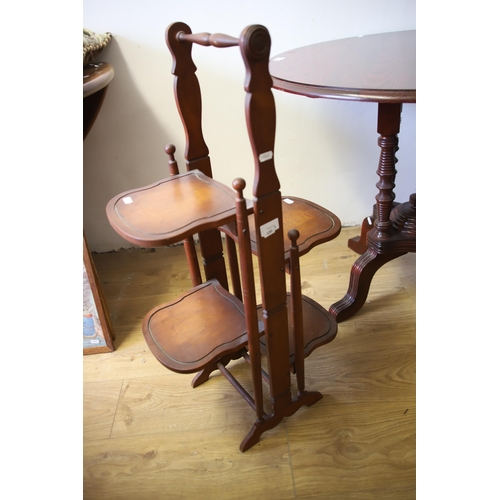 1295 - Mixed lot to include and Circular topped Table, a Folding Cake servier plus a Mahogany Commode which... 