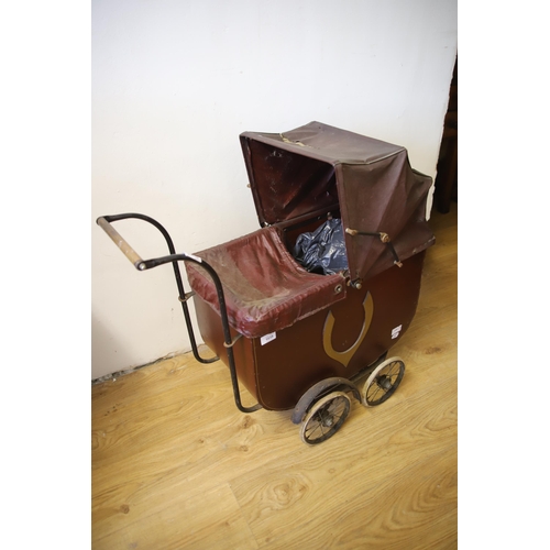 1299 - Victorian Dolls Pram along with a Wicker rocking crib.  Pram measures approx 30 inches tall.  See ph... 