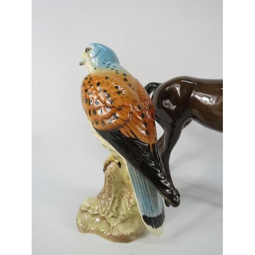 61 - Beswick Kestral figurine and Swish tail mare.