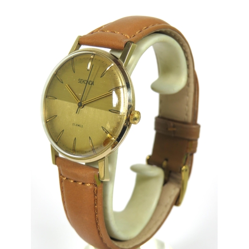 141 - Sekonda 27 Jewel Gents watch with gold tone face in Working order. Good Beige leather strap. See pho... 