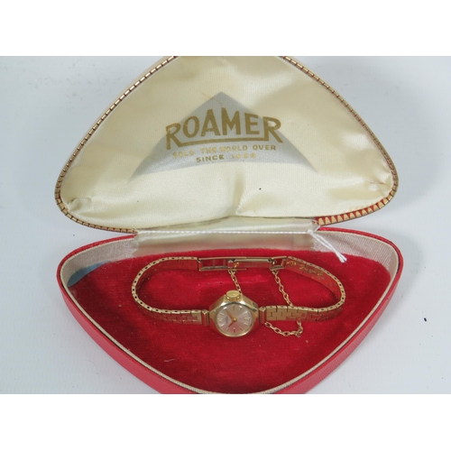 145 - 9ct Yellow Gold 'Romer' ladies watch with 9ct Gold strap with safety chain fitted. Comes with origin... 