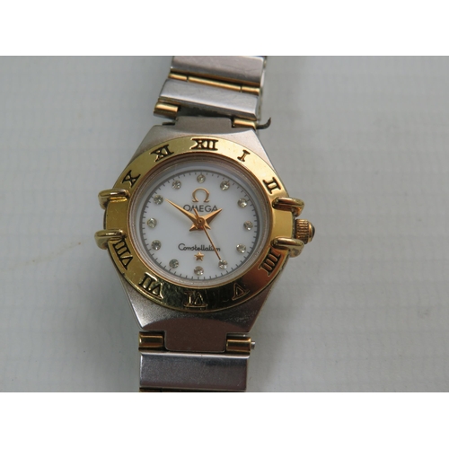 152 - Ladies Watch Marked 'Omega Constellation' Quartz Movement with Two tone metal strap. Crude repair to... 