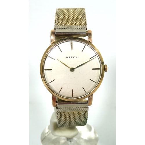 167 - Marvin' Gents watch with 9ct Yellow Gold Case. Gold tone Steel mesh multi adjustable strap. Running ... 