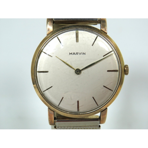 167 - Marvin' Gents watch with 9ct Yellow Gold Case. Gold tone Steel mesh multi adjustable strap. Running ... 