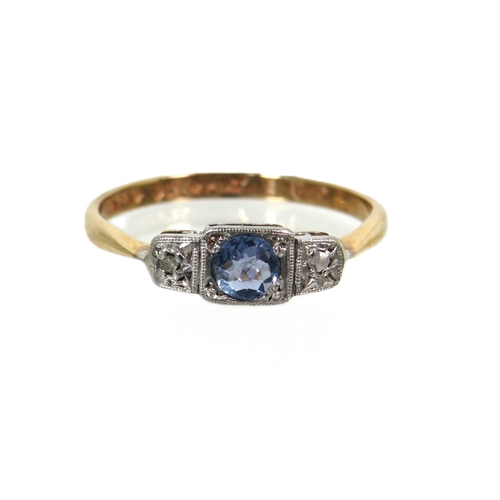 177 - Pretty 9ct Yellow Gold ring with a single Topaz flanked by twin Diamonds, set on a Platinum Mount. F... 