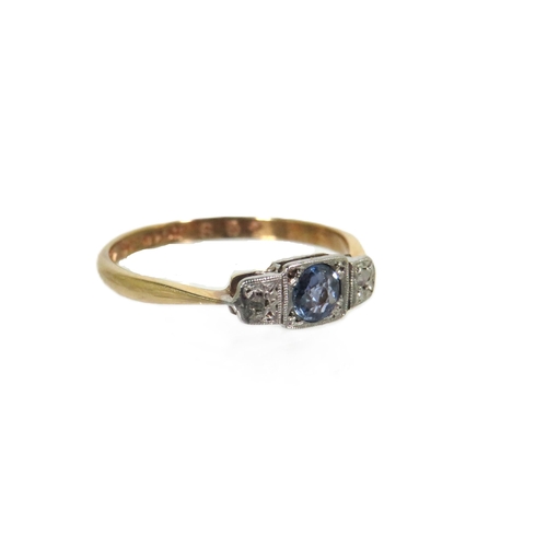 177 - Pretty 9ct Yellow Gold ring with a single Topaz flanked by twin Diamonds, set on a Platinum Mount. F... 