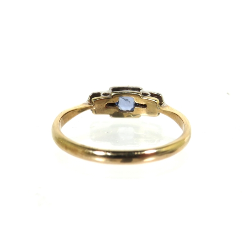 177 - Pretty 9ct Yellow Gold ring with a single Topaz flanked by twin Diamonds, set on a Platinum Mount. F... 