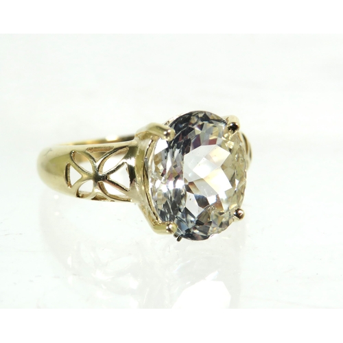 184 - 9ct Yellow Gold Ring with pierced Shoulders set with a large clear CZ Gemstone which measures approx... 