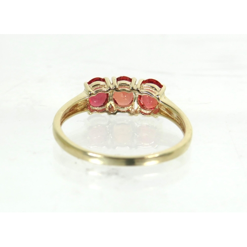 185 - 9ct Yellow Gold ring set with a trio of Ruby coloured CZ set Gemstones.   Finger size 'L'   1.5g