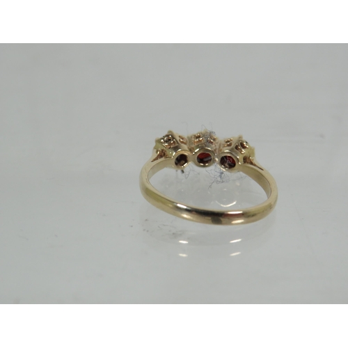 186 - 9ct Yellow Gold ring set with Triple Garnets each of approx 4.5mm. Finger size 'N'   2.7g