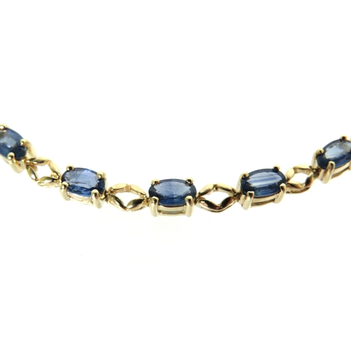 188 - Yellow Gold 8 inch Bracelet marked 10ct set with 19 oval Topaz (4mm) in excellent condition.  Total ... 