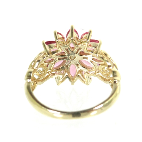 191 - 9ct Yellow Gold Ring set with Pink Sapphire/Pink Tourmaline set in a Flower pattern. Scrolled Should... 