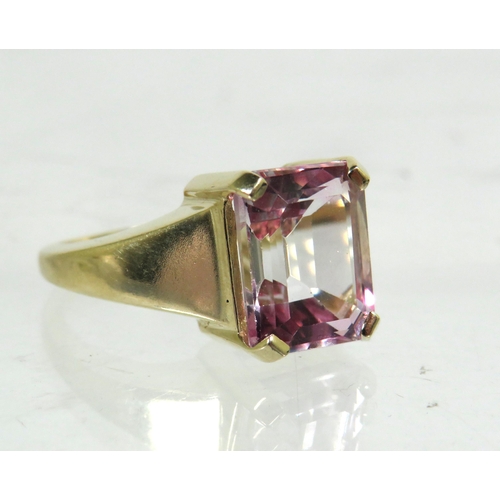 192 - 9ct Yellow Gold Ring set with a large, Emerald Cut Pink Amethyst .  Finger size 'L'   5.0g