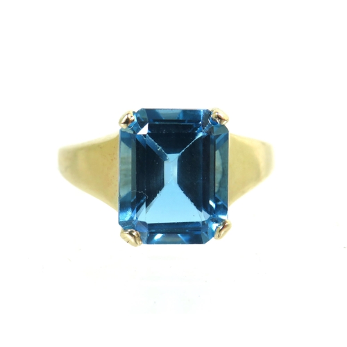 196 - 9ct Yellow Gold Ring set with a large Lab Created Topaz which measures 11 x 9 mm.   Finger size 'M' ... 