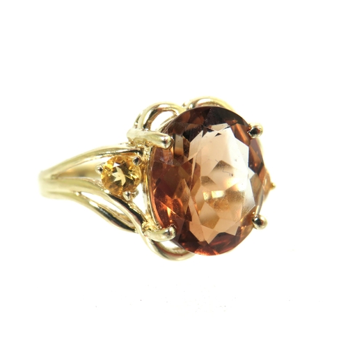 198 - 9ct Yellow Gold Ring set with an Amber Coloured Smokey Quartz which measures approx 12 x 10mm  Finge... 