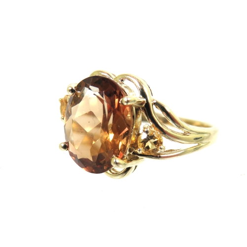 198 - 9ct Yellow Gold Ring set with an Amber Coloured Smokey Quartz which measures approx 12 x 10mm  Finge... 