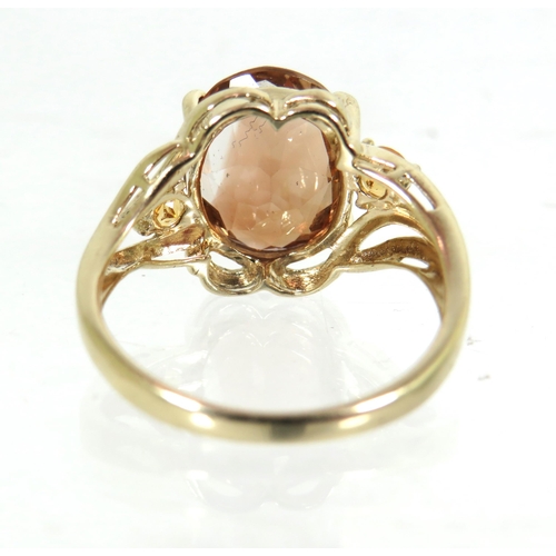 198 - 9ct Yellow Gold Ring set with an Amber Coloured Smokey Quartz which measures approx 12 x 10mm  Finge... 