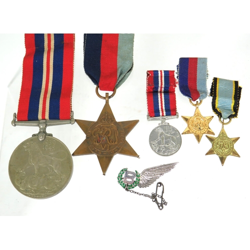 406 - Selection of WW2 Medals plus Minature dress medals plus a Sterling Silver  Bomb Aimers Sweetheart ba... 