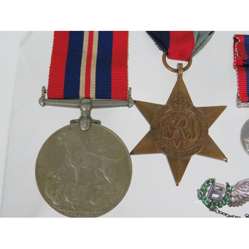 406 - Selection of WW2 Medals plus Minature dress medals plus a Sterling Silver  Bomb Aimers Sweetheart ba... 