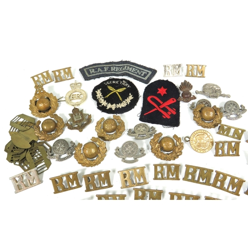 414 - Selection of Military badges, pit checks, Buttons etc. see photos.