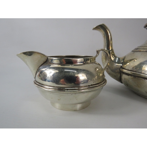 32 - Hallmarked London c1922 Sterling silver teapot, sugar bowl and milk jug. Total weight 590 grams.