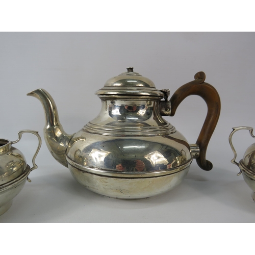 32 - Hallmarked London c1922 Sterling silver teapot, sugar bowl and milk jug. Total weight 590 grams.