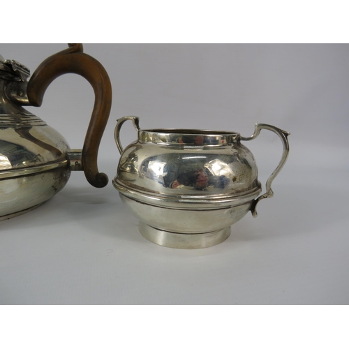 32 - Hallmarked London c1922 Sterling silver teapot, sugar bowl and milk jug. Total weight 590 grams.