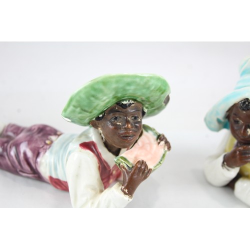 241 - Antique Porcelain Ornaments of Two Children     574374