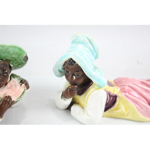 241 - Antique Porcelain Ornaments of Two Children     574374