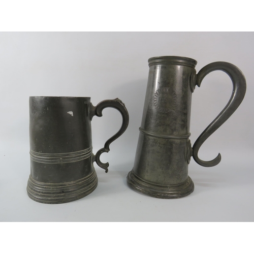 69 - THIS LOT HAS NOW BEEN WITHDRAWN BY THE VENDOR. Two antique Pewter tankards, the tallest measures 9