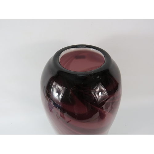 75 - Large burgundy swirl cased art glass vase, 14