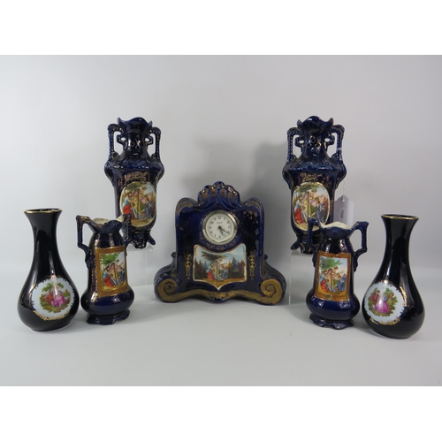 113 - Vintage Austrian porcelain clock with matching vases plus two Limoges vases.