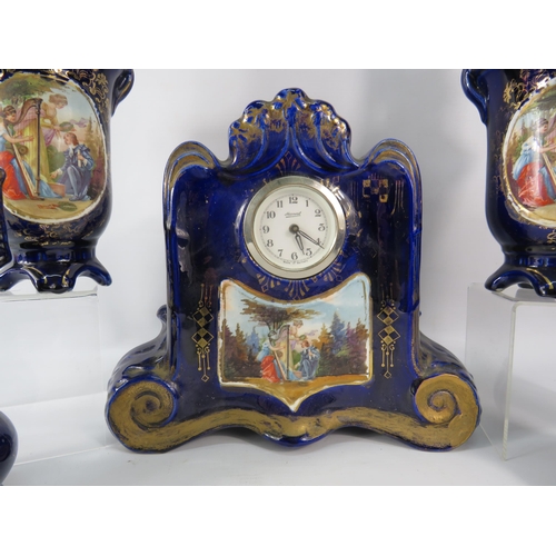 113 - Vintage Austrian porcelain clock with matching vases plus two Limoges vases.