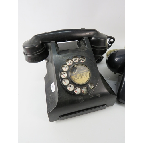 129 - Vintage Bakelite telephone plus a Silver Jubilee coin set telephone.