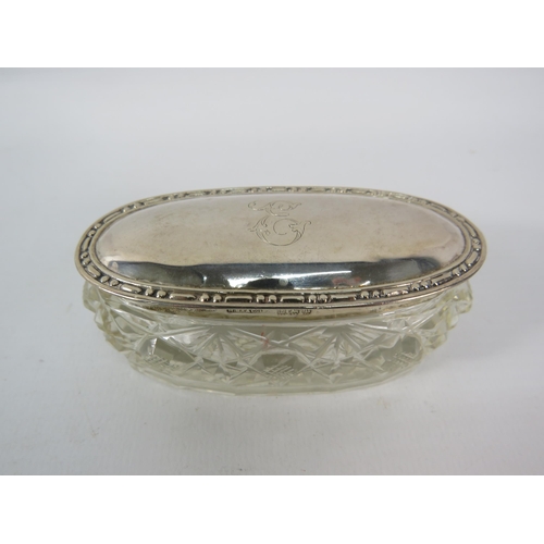 157 - Oval shaped sterling silver lidded dressing table pot Birmingham 1902.