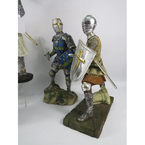 181 - Five large resin Knight figurines the tallest stands 15.5