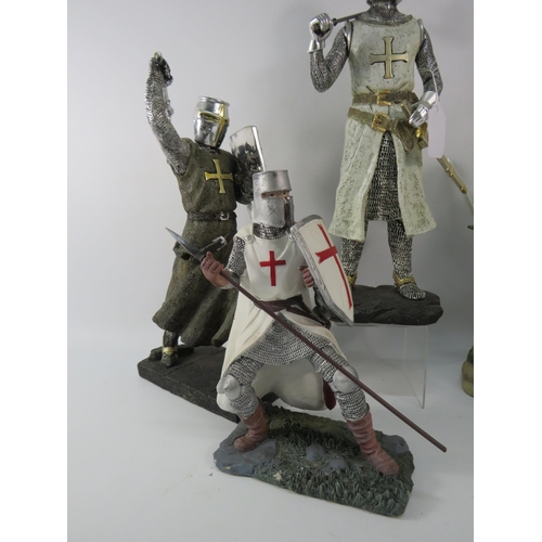 181 - Five large resin Knight figurines the tallest stands 15.5