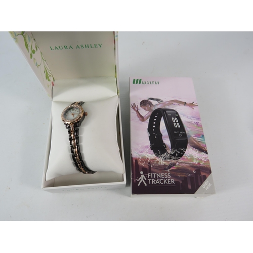 324 - Ladies Laura Ashley wristwatch and a ladies fitness tracker watch.