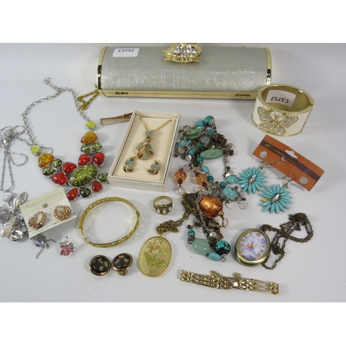 328 - Mixed costume jewellery lot including a rolled gold bangle etc.