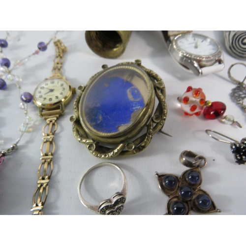 329 - Mixed lot of costume jewellery including a victorian brooch, Sterling silver ring and pendant etc.