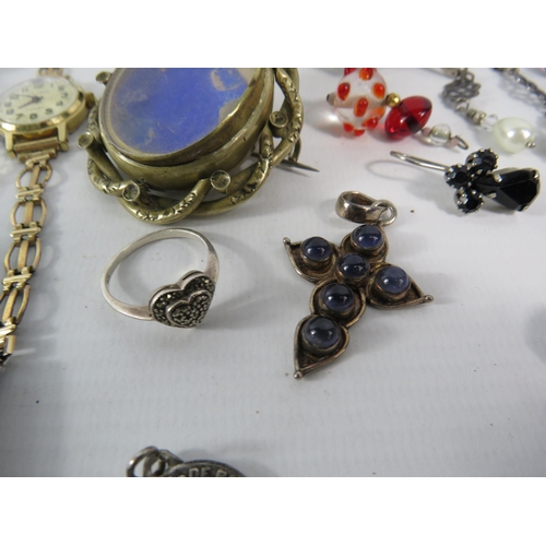 329 - Mixed lot of costume jewellery including a victorian brooch, Sterling silver ring and pendant etc.