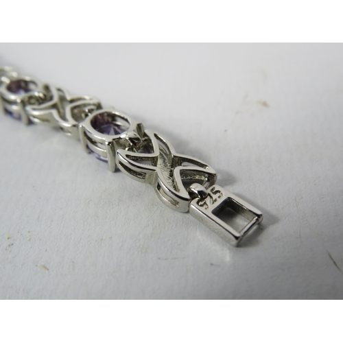 333 - 925 Silver bracelet set with lab created amethyst stones, comes with extention link.