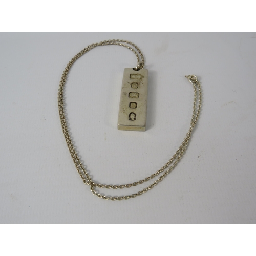 346 - Sterling Silver Ingot and chain, total weight 34 grams.